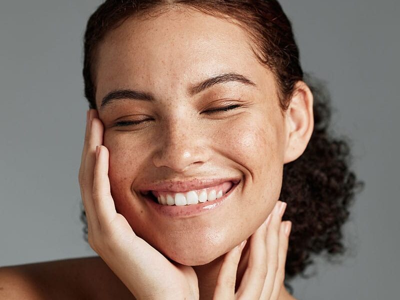 woman smiling after her blepharoplasty in Bellevue, WA