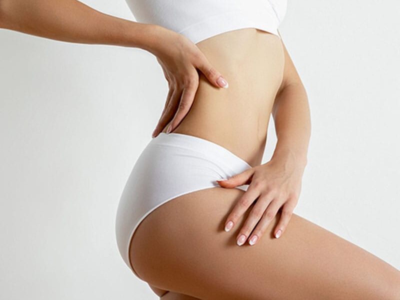 woman after getting liposuction in Bellevue, WA